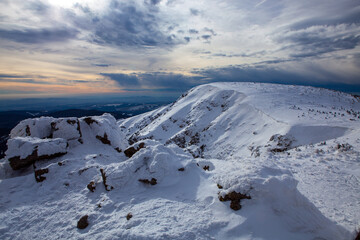 Panorama of winter mountain landscape from the mountain ridge