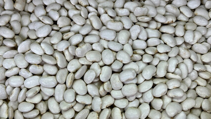 direct top view group of raw Japanese white beans ready to cook under natural light