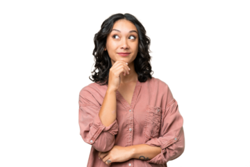 Young Argentinian woman over isolated background thinking an idea while looking up