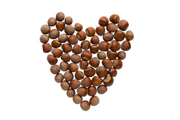 Hazelnut nuts in shell, heart. png, isolated on transparent background. Top view. Copy space. Love concept. Products to strengthen the heart.