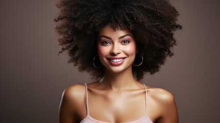 Image of beautiful young african american woman smiling and looking at camera.