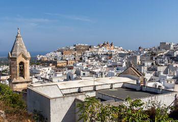 Ostuni, Italy - one of the most beautiful villages in South Italy, Ostuni displays a wonderful Old Town with an unmistakeable profile and its white buildings - obrazy, fototapety, plakaty