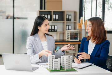 Customers who choose to buy a condominium room and a bank approve a loan for their purchase. Condominium and house loan interest rate from bank - obrazy, fototapety, plakaty