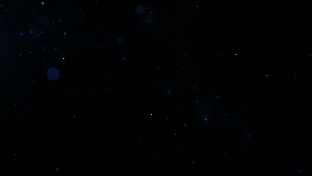 Elegant Looping Blue Particle Light. For celebration and festive video background