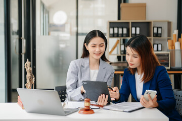 Asian Business law concept, Lawyer business lawyers are consulting lawyers for women entrepreneurs to file copyright lawsuit