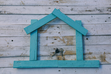 Concept of a brand new house with key delivery
