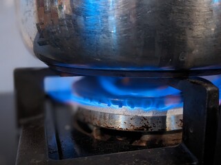 Pot on burning stove