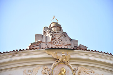 Top of the facade of old library building in Prague Czech Republic on a bright sunny day