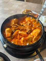 A bowl of spicy tofu soup.