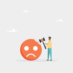 Concept of overcoming stress and negative influence. Stress resistance, victory over depression. The guy hits a sledgehammer with a negative emoticon.
