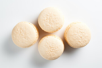 Fototapeta na wymiar three macarons are arranged on a white surface
