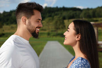 Romantic date. Beautiful couple spending time together outdoors