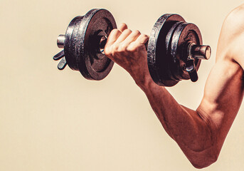 Weak man lift a weight, dumbbells, biceps, muscle, fitness. Skinny guy hold dumbbells up in hands....