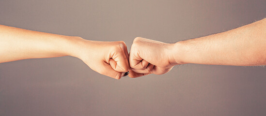 Fist Bump. Clash of two fists. Gesture of giving respect or approval. Friends greeting. Teamwork...