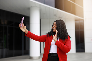 online broadcast via mobile phone of a successful African female