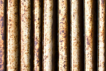 Metal stripes pattern. Rusty background. Ventilation grille texture. Industrial iron metal bars....