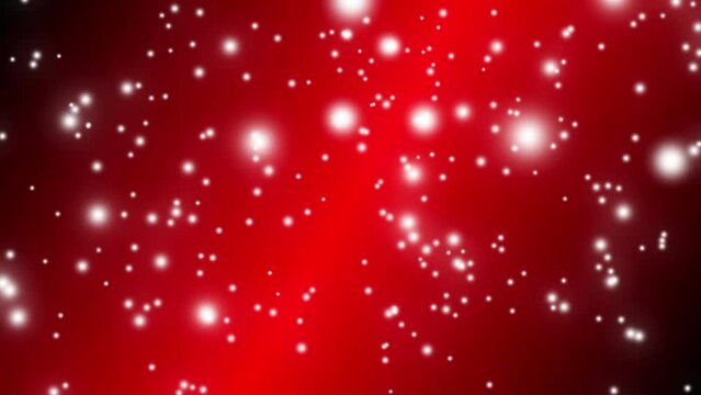 Abstract background with white snow falling slowly from top to bottom on red background. Merry Christmas, Happy New Year, and Happy Holidays greeting. Copy space.