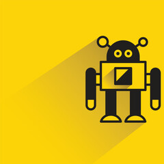 robot with shadow on yellow background