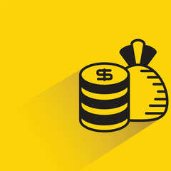 dollar coin and sack with shadow on yellow background
