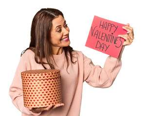 Woman with Valentine's sign and heart box in studio