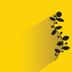 leaves and flower with shadow on yellow background