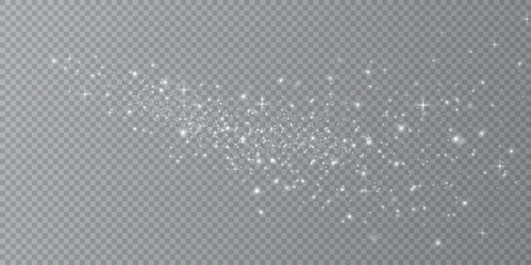 Particles of white magic dust. Shining light particles.Christmas glitter particles. Light effect on a transparent background	