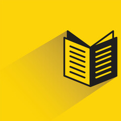 book icon with shadow on yellow background