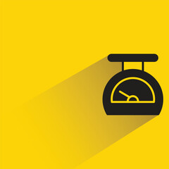 kitchen scale icon with shadow on yellow background
