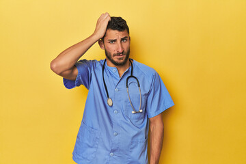 Young Hispanic male nurse Young Hispanic male nurse poses confidently being shocked, she has...