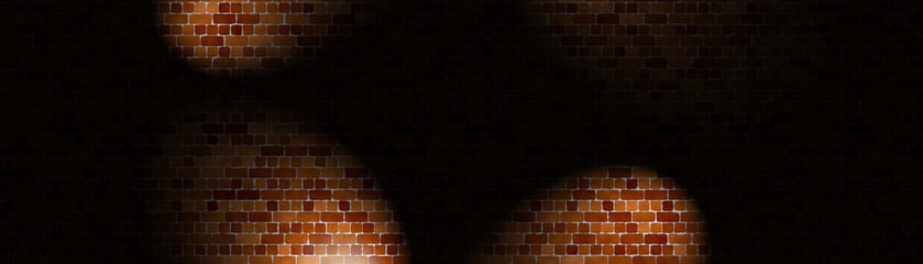 Brick wall with light illuminating the center