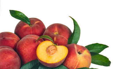 heap of peaches, with one cut in half on a white background-2
