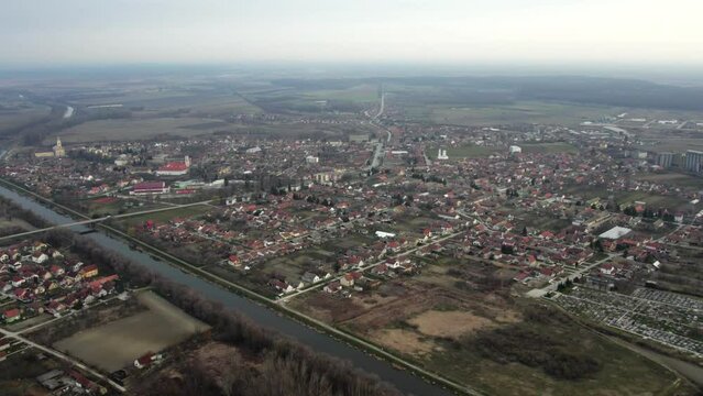 Panoramic footage captures the town of Bac in Serbia under the shadow of a cloud