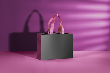 Black paper glossy shopping bag mockup with rose handles.