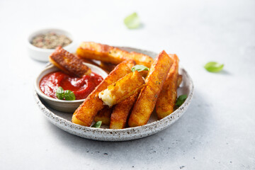 Traditional roasted halloumi cheese with tomato sauce