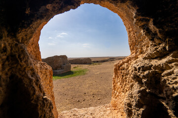 Ruins of rock cut building in Dara ancient city. Mardin, Turkey.