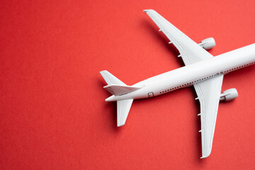 Airlines plane on a red background. Booking flight tickets. Planning your trips. Additional service...