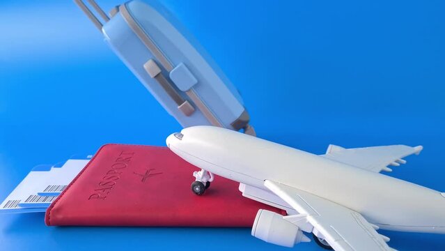 Airplane travel and toy airplane for your passport and suitcases. Baggage and weight