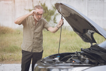 Senior elderly male car broken have a trouble engine fail alone nobody help open hood for self...