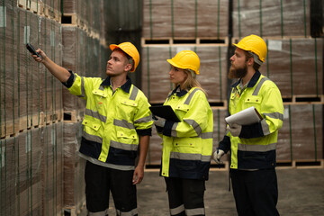 Team Caucasian businessman and businesswoman checking stock with bar code scanner