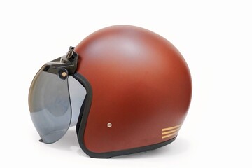 Brown motorbike helmet on white background