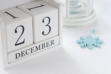 23 th December. White block calendar presents date 23 and month December, website events.  Winter decoration concept. Winter days.