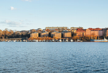 view of the old town stockholm on sunset light with colored buildings 