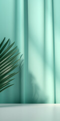 Minimalist pale turquoise background with tropical palm leaves and shadow from striped window curtains on the wall for product photography with minimalist design and tropical mood.