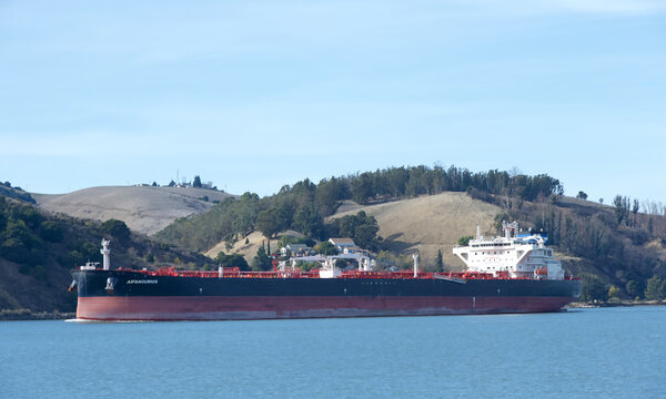 Benicia, CA - Dec 9, 2023: Chevron Cruise Oil Tanker AIFANOURIS traveling in the Carquine Straight, passing Benicia.