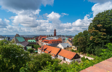 Panoramic cityscape view with the clock tower of City Hall and roofs of Helsingborg town, Sweden.