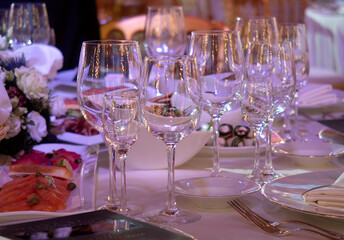 glasses of champagne on the New Year's table - 691596590