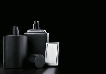 Set of perfume bottles on black background. Black and white. Scent fragrance cosmetic beauty product promo