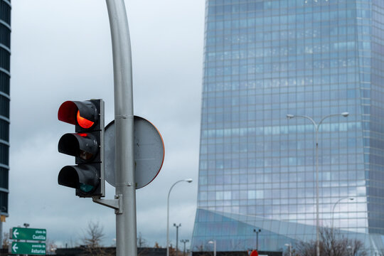 Traffic light in a modern financial area in the city of Madrid in Spain