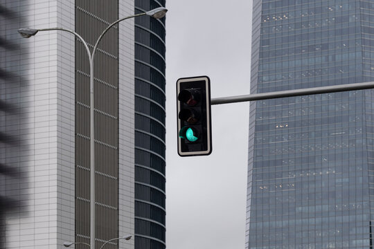 Traffic light in a modern financial area in the city of Madrid in Spain