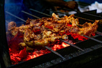 Making Chicken BBQ in street food shops in Sri Lanka.